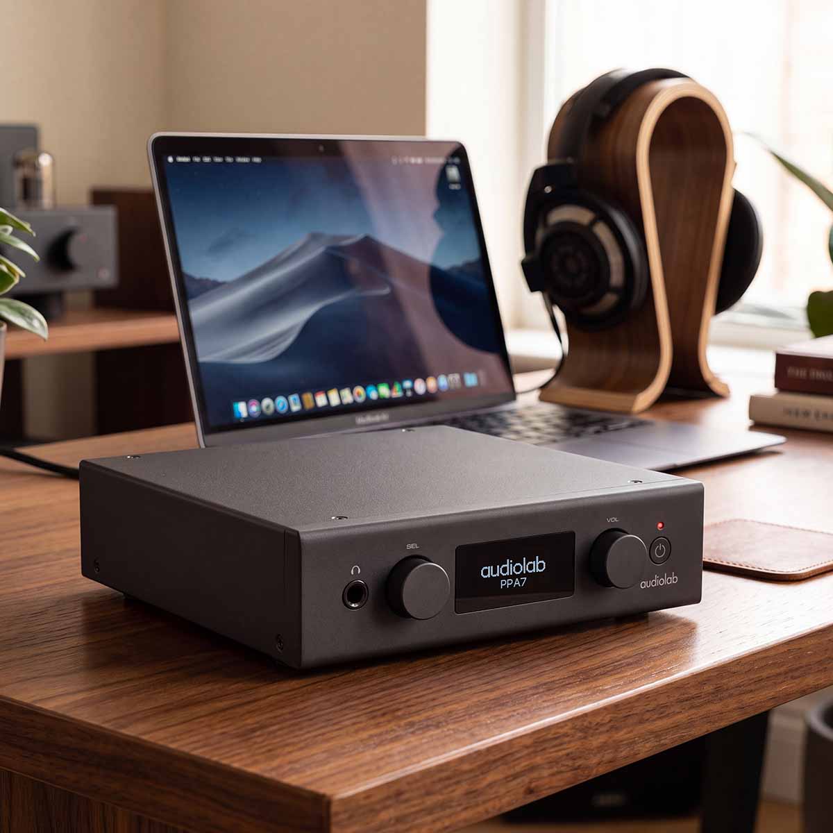 Audiolab PPA7 Phono Preamplifier - Black - lifestyle photo of unit on desk in front of laptop