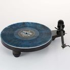 Rega Replay Turntable - front view with blue record on platter