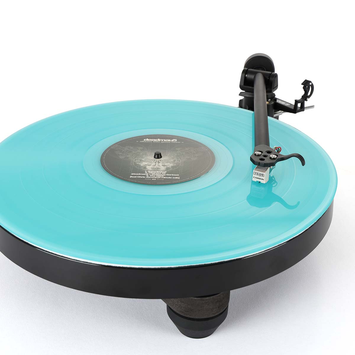 Rega Replay Turntable - front view with tonearm engaged over blue record