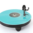 Rega Replay Turntable - front view with tonearm engaged over blue record