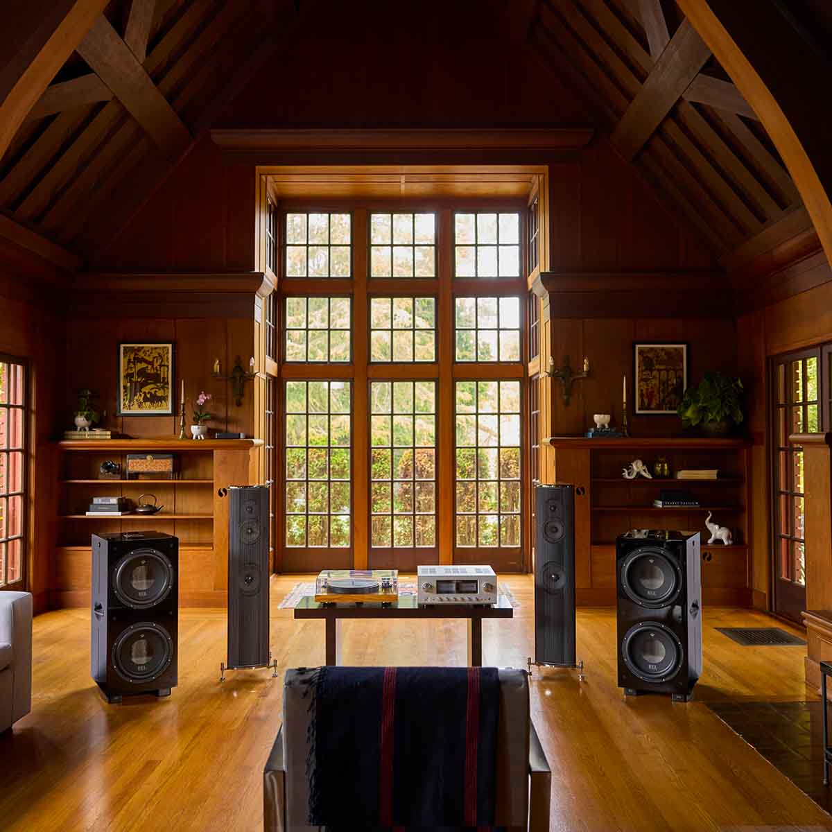 REL Acoustics 212 Black Label Subwoofer without grille lifestyle photo 2 units on either side of system