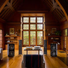 REL Acoustics 212 Black Label Subwoofer without grille lifestyle photo 2 units on either side of system