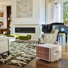 REL Acoustics S/850 Subwoofer - white - lifestyle photo of subwoofer in living room with grille