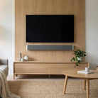 Lyngdorf SB-75 Passive Stereo Speaker Bar - lifesyle photo of unit mounted below TV