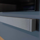 Lyngdorf SB-75 Passive Stereo Speaker Bar - lifesyle photo of unit mounted below TV closeup of right side of unit