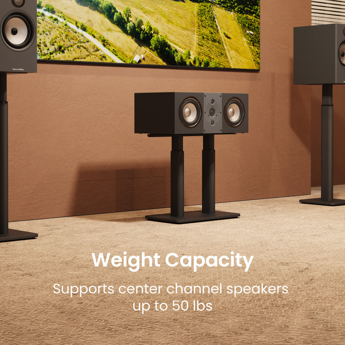 Center channel speaker on a stand with text about weight capacity in a room setting.