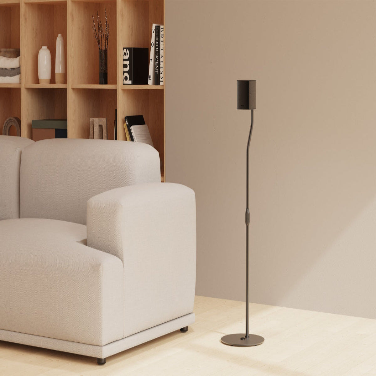 Modern living room with a beige sofa and a floor lamp.