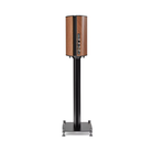 A high-end floor-standing speaker on a slim black metal stand, featuring a vertical wood-grain cabinet with a dark center stripe and control buttons, set against a plain white background.