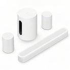 Sonos Beam Ultra Soundbar - white - front and top view angled right with one Sonos Sub Mini and two Sonos Era 100 behind bar