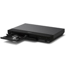 Sony UBP-X700U Blu-ray Disc Player front and top view angled left with disc tray ejected