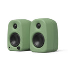 Kanto UKI Compact Desktop Speakers - Sage pair - angled front view