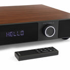 Victrola Soundstage Speaker System - Walnut - close-up of front panel and knob with remote to front