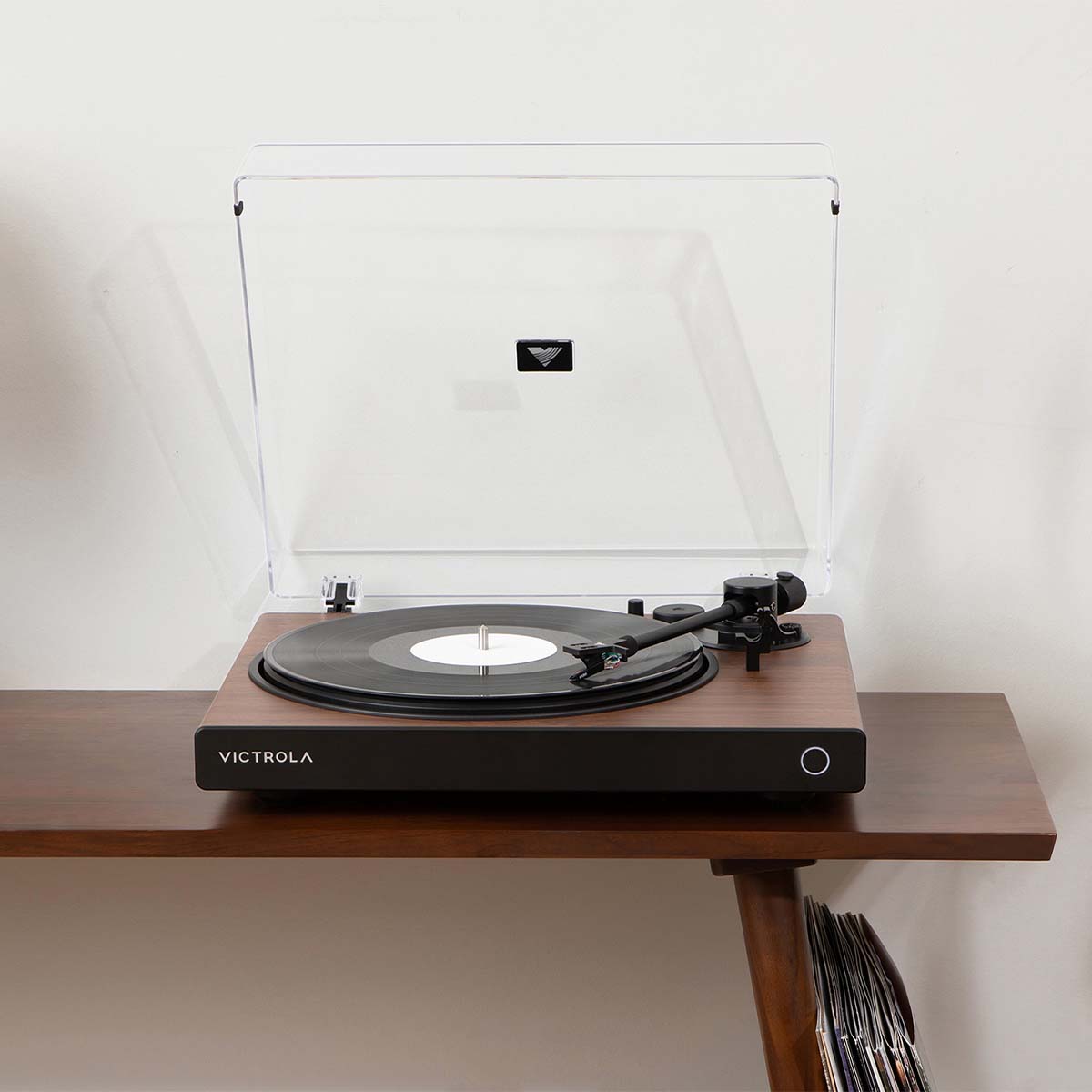 Victrola Wave Bluetooth Turntable - walnut with open dust cover - lifestyle image