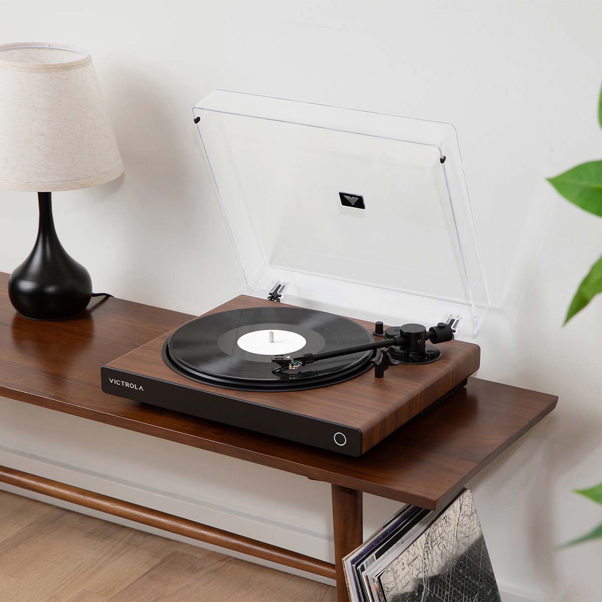 Victrola Wave Bluetooth Turntable - walnut with open dust cover - lifestyle image