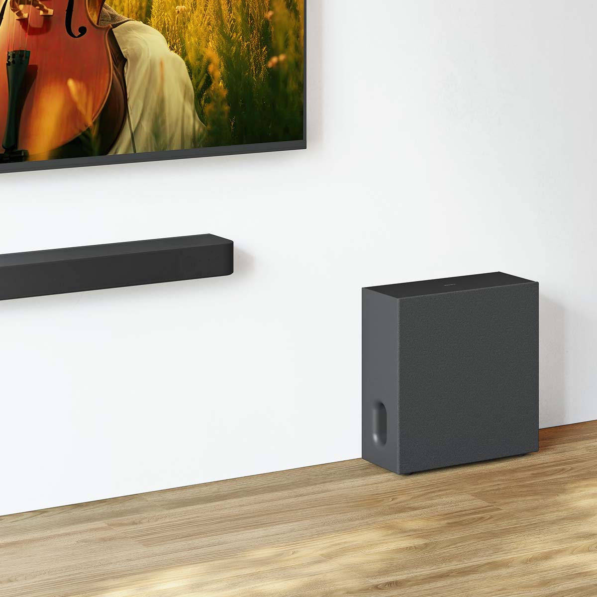 Sony BRAVIA Sub 7 Wireless Subwoofer side by side lifestyle showing subwoofer on floor along wall to right of tv and mounted soundbar