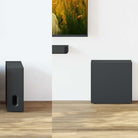 Sony BRAVIA Sub 7 Wireless Subwoofer side by side lifestyle showing subwoofer oriented perpendicular to wall on left and parallel to wall on right