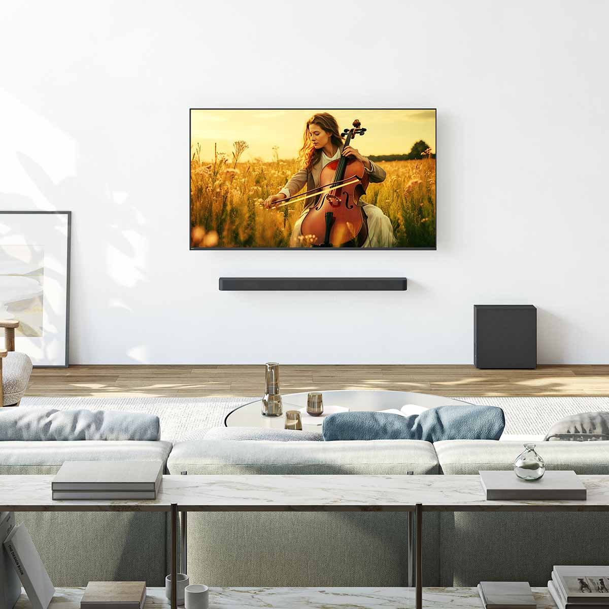 Sony BRAVIA Theater Bar 7 Soundbar + Sub 7 Wireless Subwoofer lifestyle photo of bar mounted under TV on wall with sub on floor to right