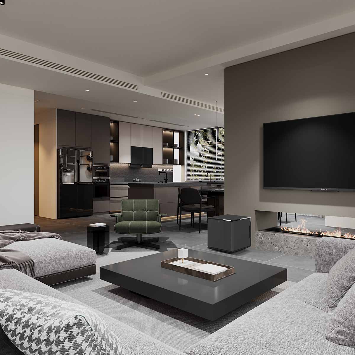 MartinLogan Grotto 15 Subwoofer - Gloss Black - lifestyle photo of unit in living room to left of TV