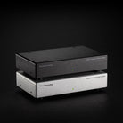 Musical Surroundings Linear Power Supply - front view of two stacked units angled right, black unit on top and silver unit on bottom