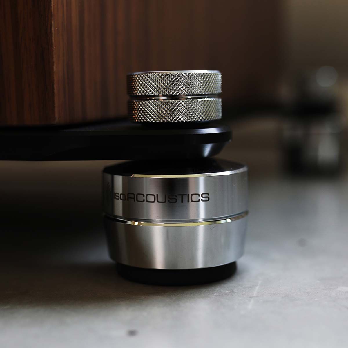 PSB Synchrony T800 Premium Tower Speaker - single walnut - zoomed view of IsoAcoustics feet