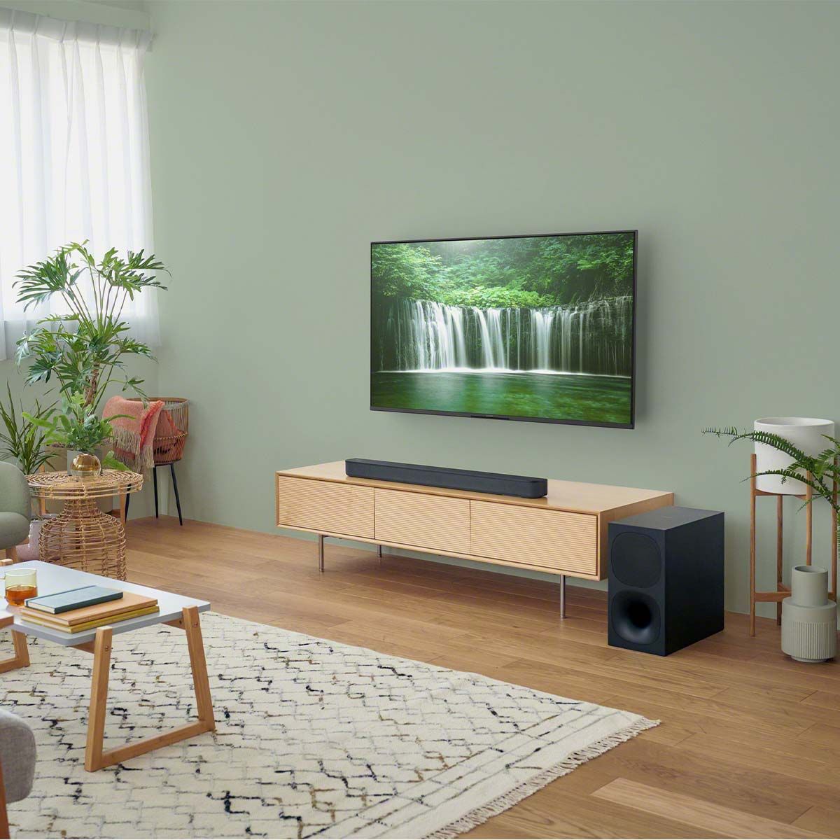 Sony HTS400 2.1ch Soundbar w/ Wireless Subwoofer - sitting on media center in living room
