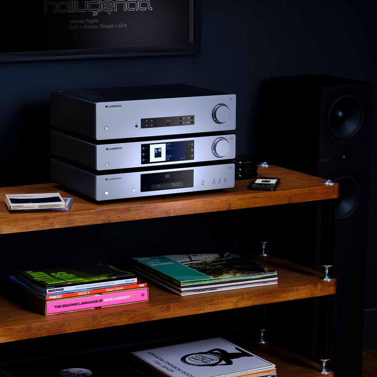 Cambridge CXN100 Network Player - Lunar Grey as part of audio stack on media console