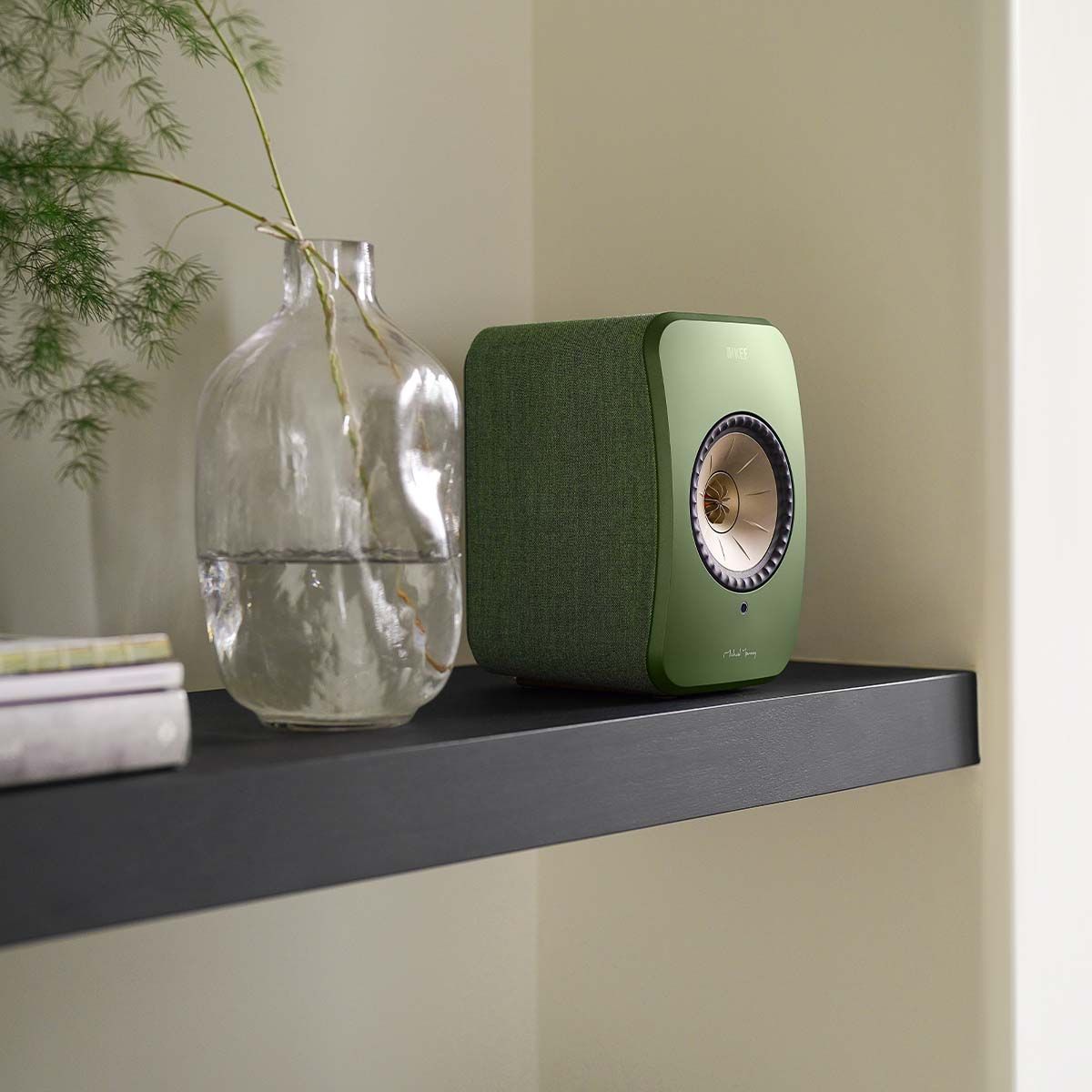 KEF LSX II Wireless HiFi Speakers - Olive Green - close-up of single speaker on shelf