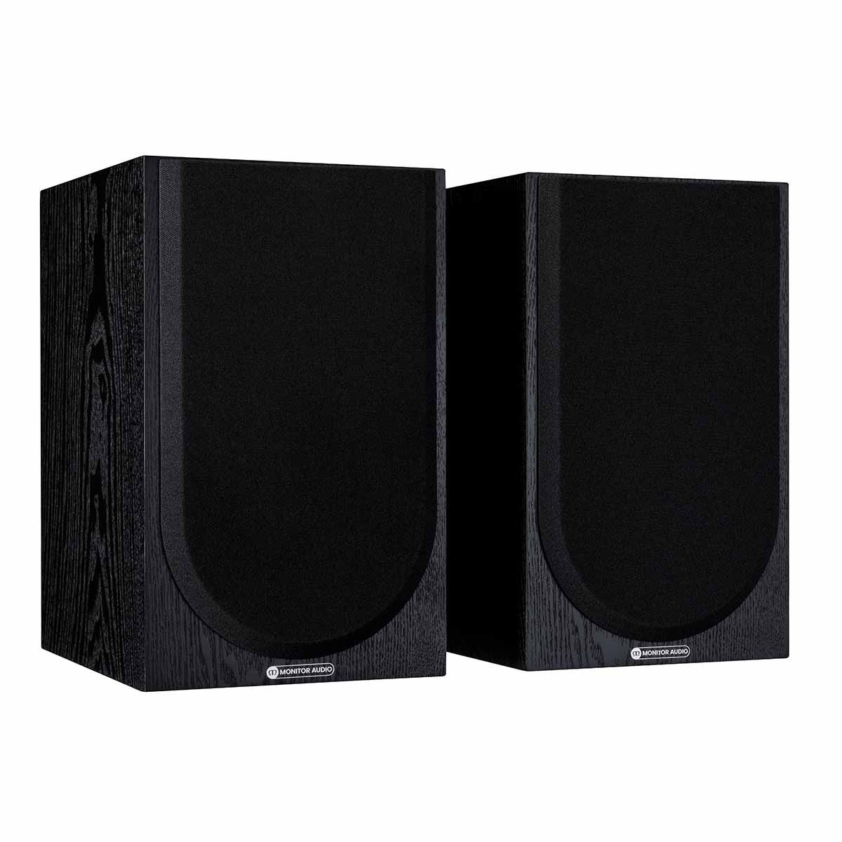 Monitor Audio Silver 100 7G Bookshelf Speakers, Black Oak, front angle with both grilles on