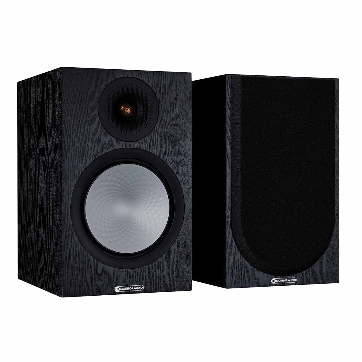 Monitor Audio Silver 100 7G Bookshelf Speakers, Black Oak, front angle with one grille on and one grille off