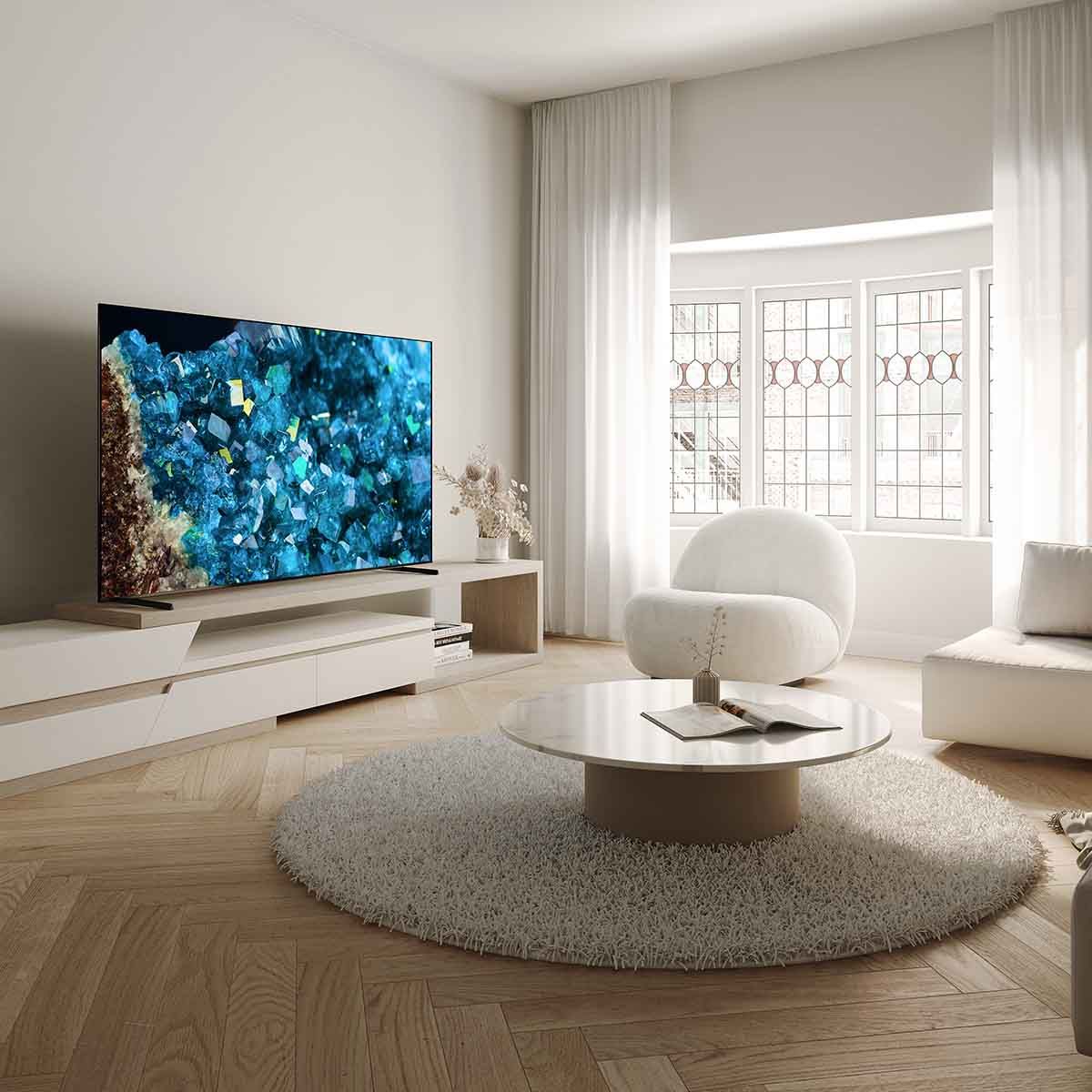 Sony BRAVIA XR A80L OLED 4K HDR Google TV (2023) on media cabinet in living room