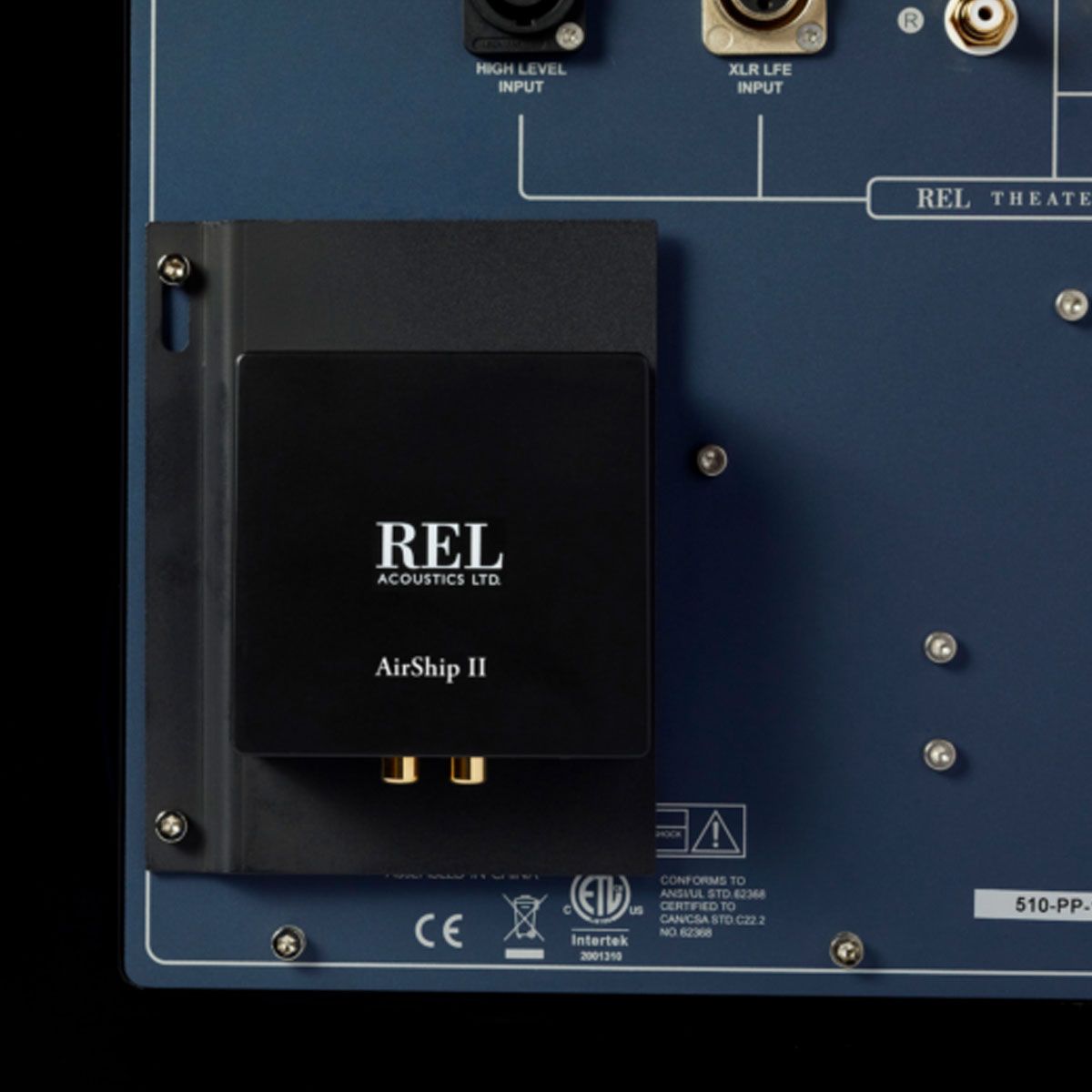 REL AirShip II Wireless Transmitter receiver mounted on rear of subwoofer