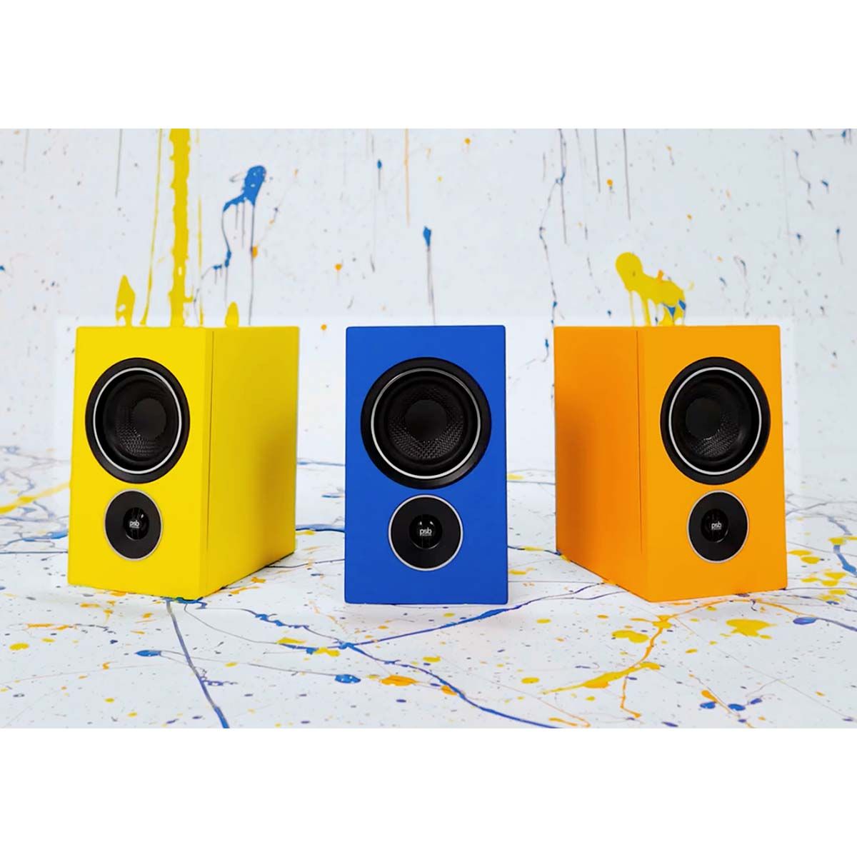 PSB Alpha iQ Streaming Powered Speakers - 3 single speakers with backdrop - (left to right) yellow, blue, and orange