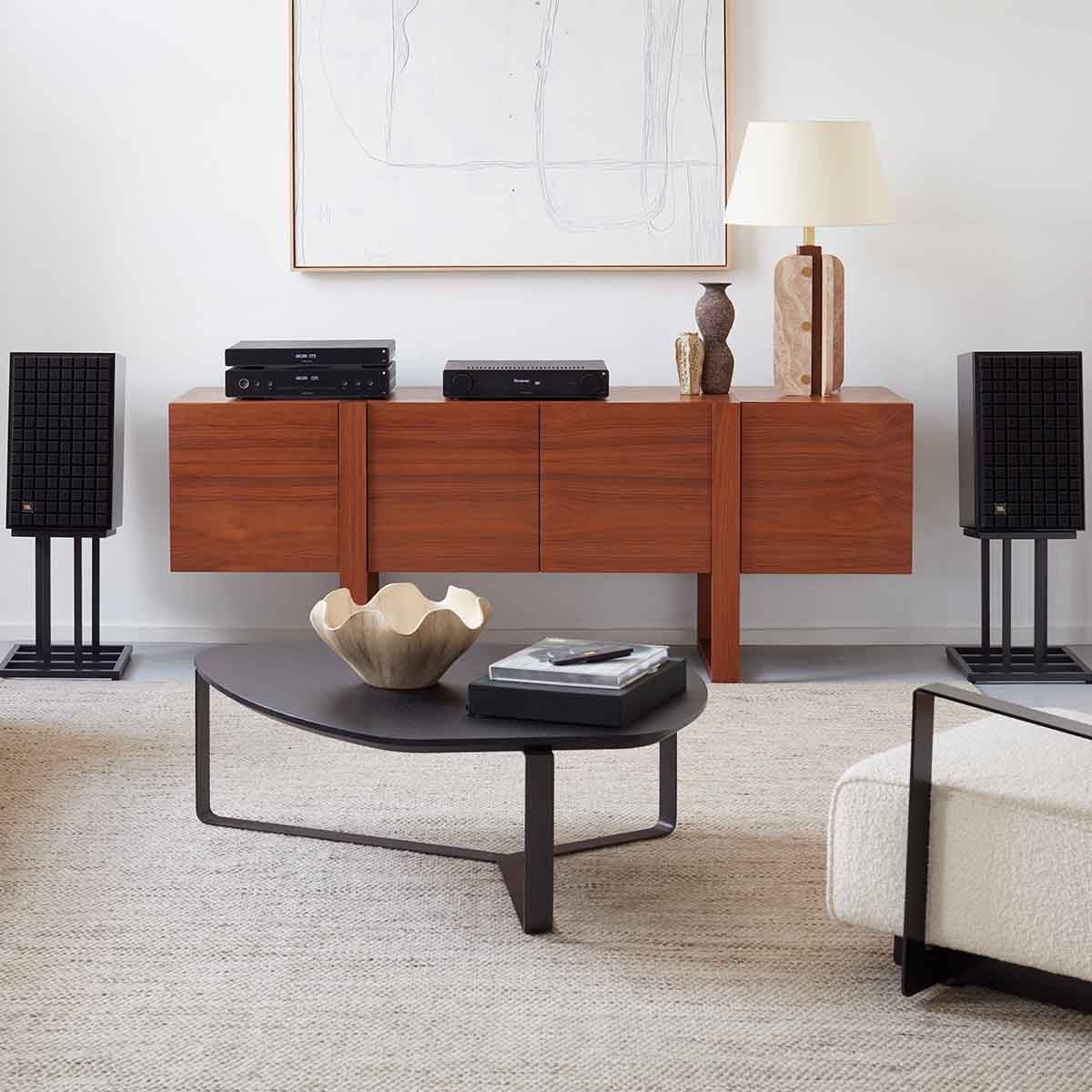 Arcam CD5 Compact Disc Player on credenza with Arcam A25 Integrated amplifier and JBL HDI tower speakers