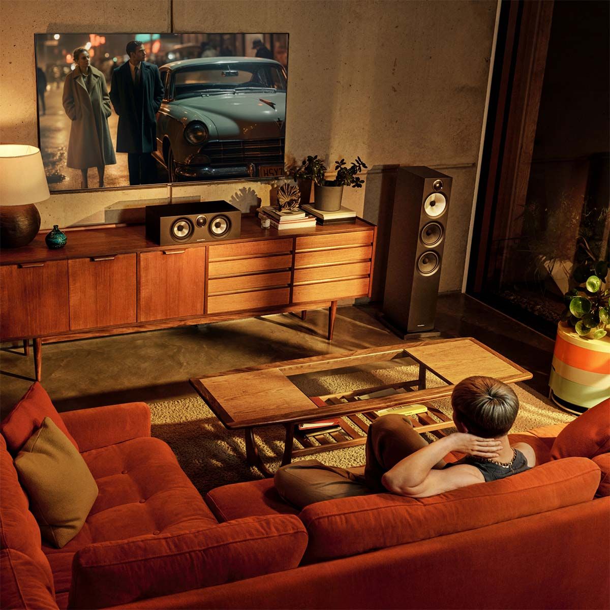 Bowers & Wilkins HTM6 S3 on media cabinet in living room home theater setup