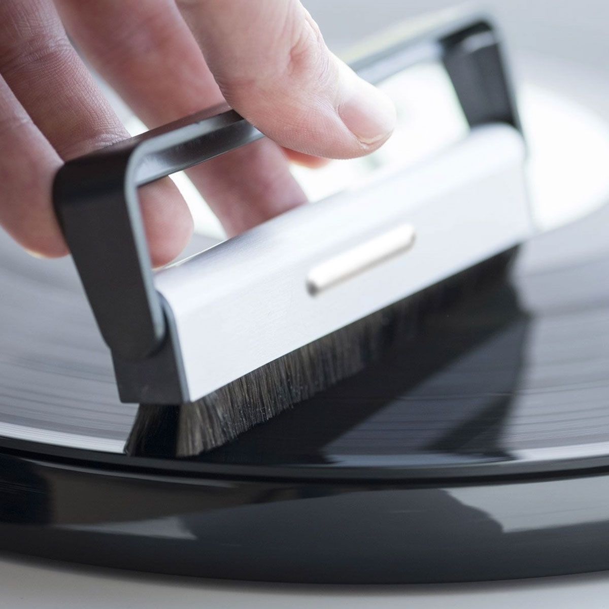 Pro-Ject Brush It being used on vinyl