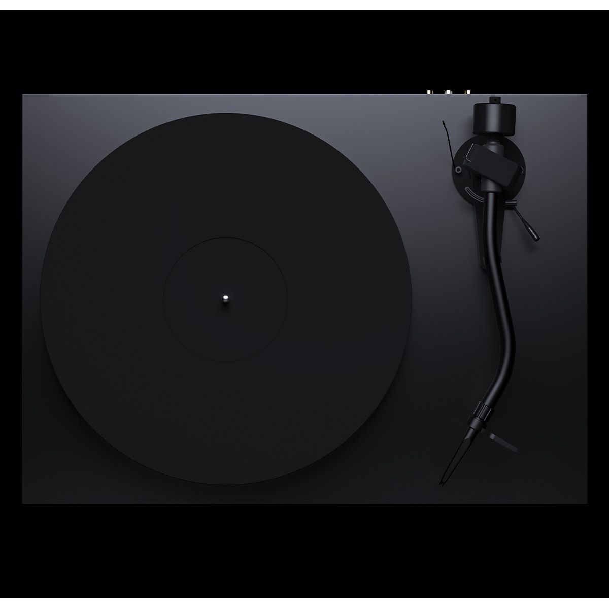 Top down view Pro-Ject Debut Pro S Turntable in Satin Black on black background showing platter and s-shaped tonearm