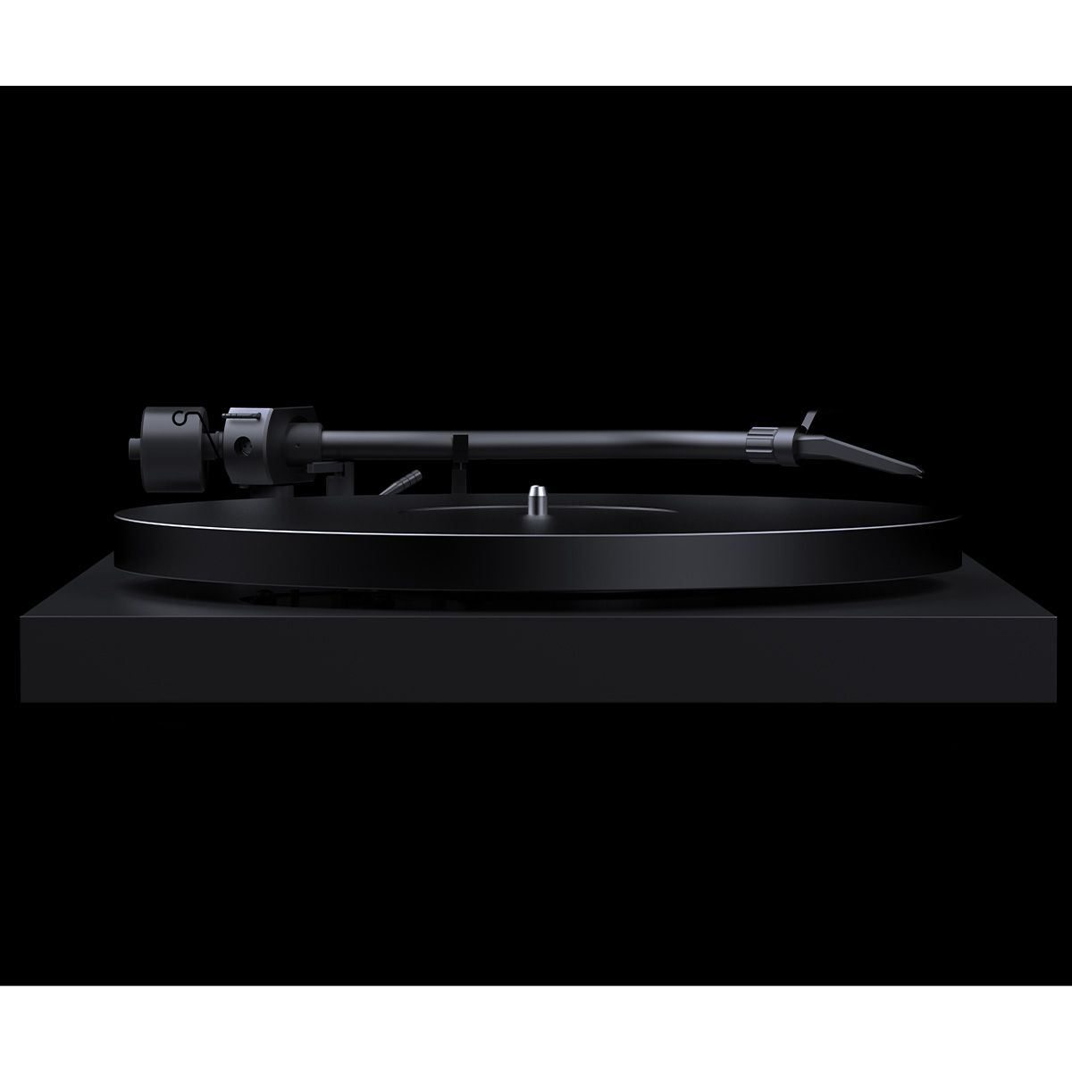 Side view Pro-Ject Debut Pro S Turntable in Satin Black on black background showing platter