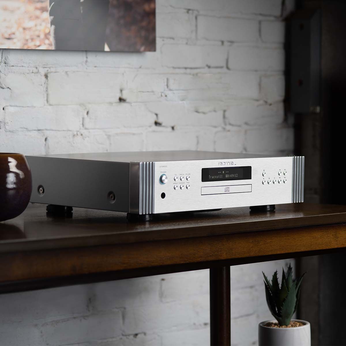 Rotel DT-6000 DAC/CD Transport - Silver - angled view sitting on table
