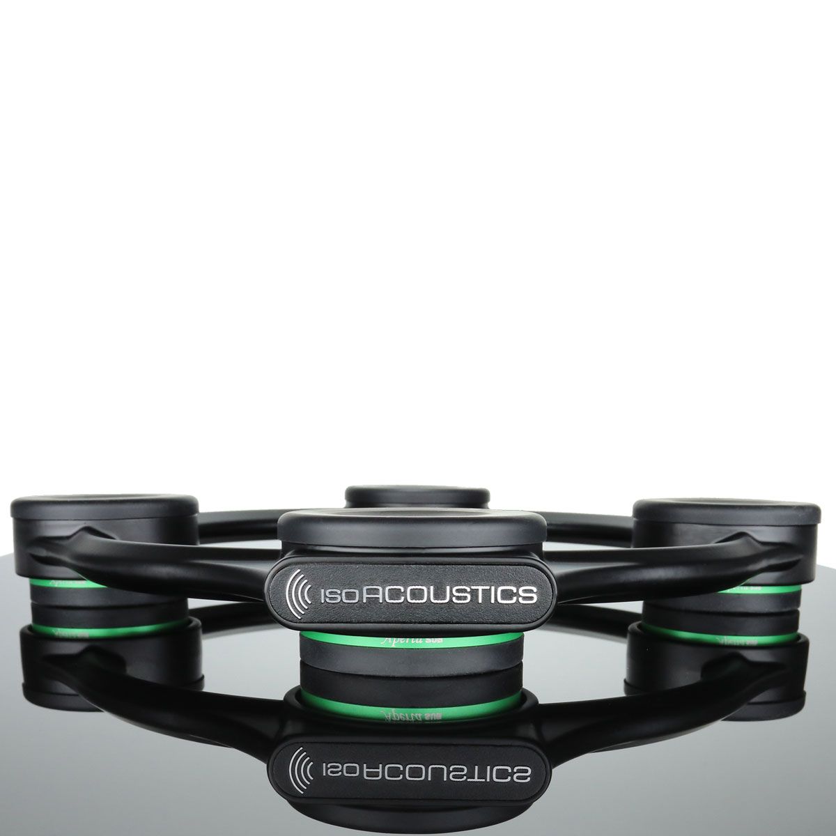 IsoAcoustics Aperta Sub Subwoofer Isolation Stand, on dark glass surface