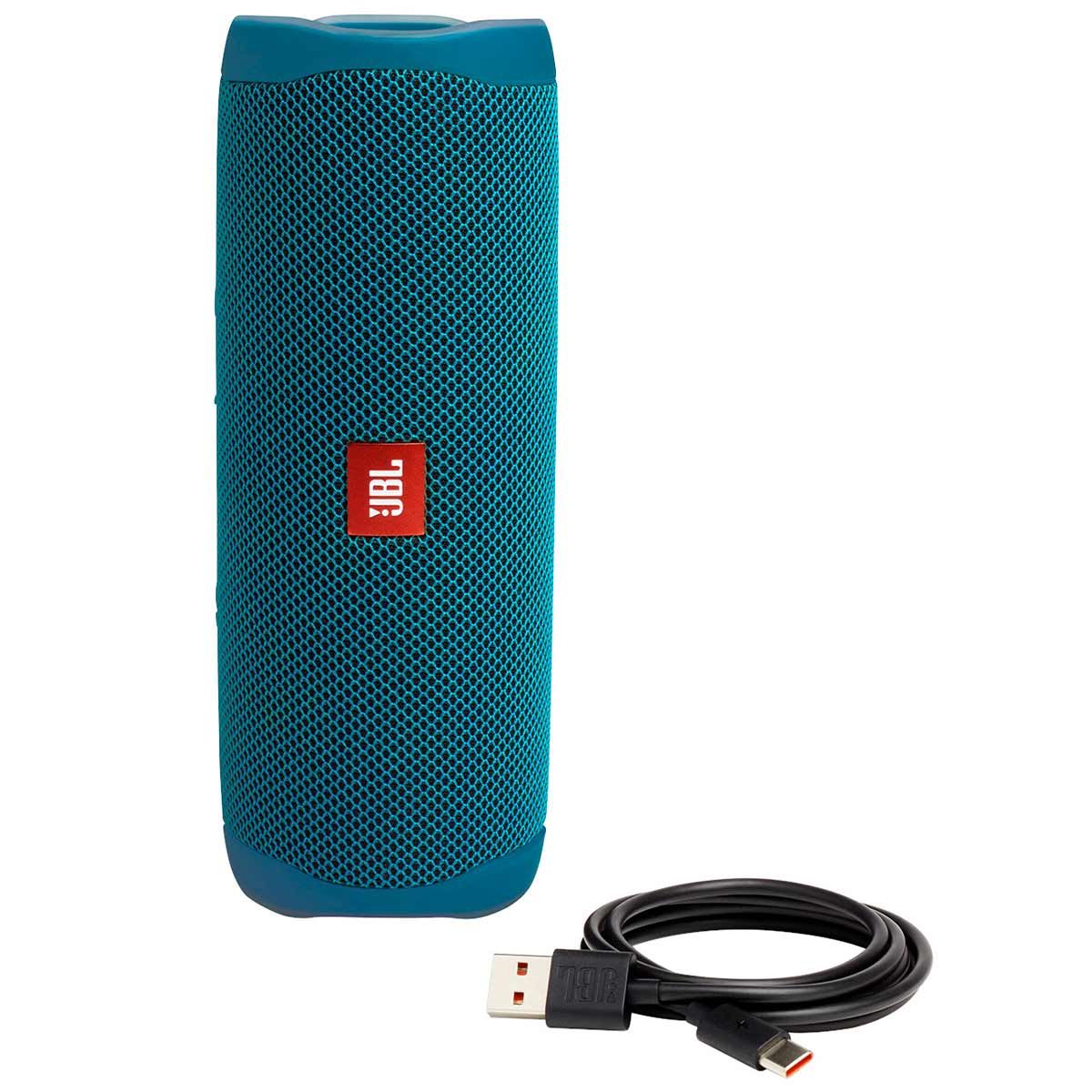 Angled view JBL Flip 5 Eco Edition Waterproof Bluetooth Speaker - Ocean Blue standing on end with charging cable