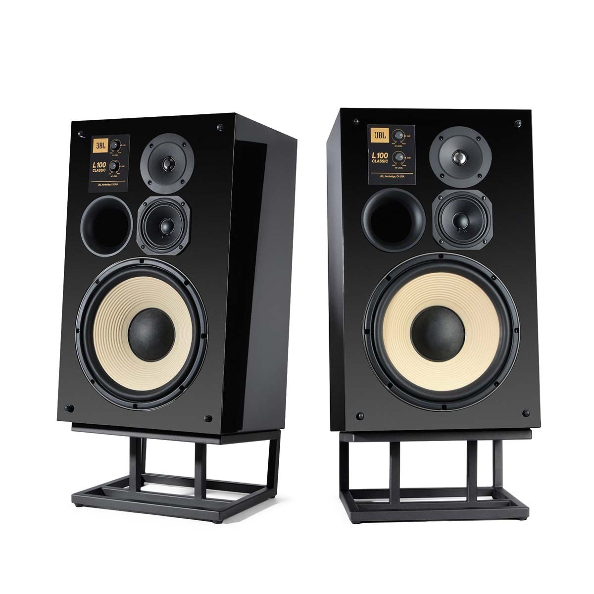 JBL L100 Classic Bookshelf Speaker - Limited Edition Gloss Black angled front view of pair on JS120 stands without grilles