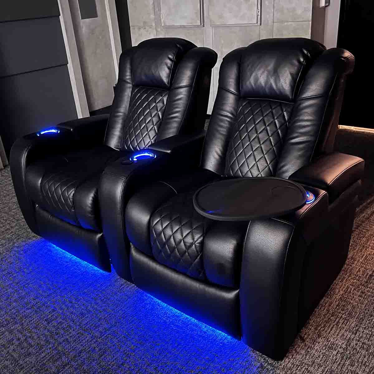 Audio Advice Revelation Home Theater Seating - right angled front view of 2 chair row with tray table and LEDs on