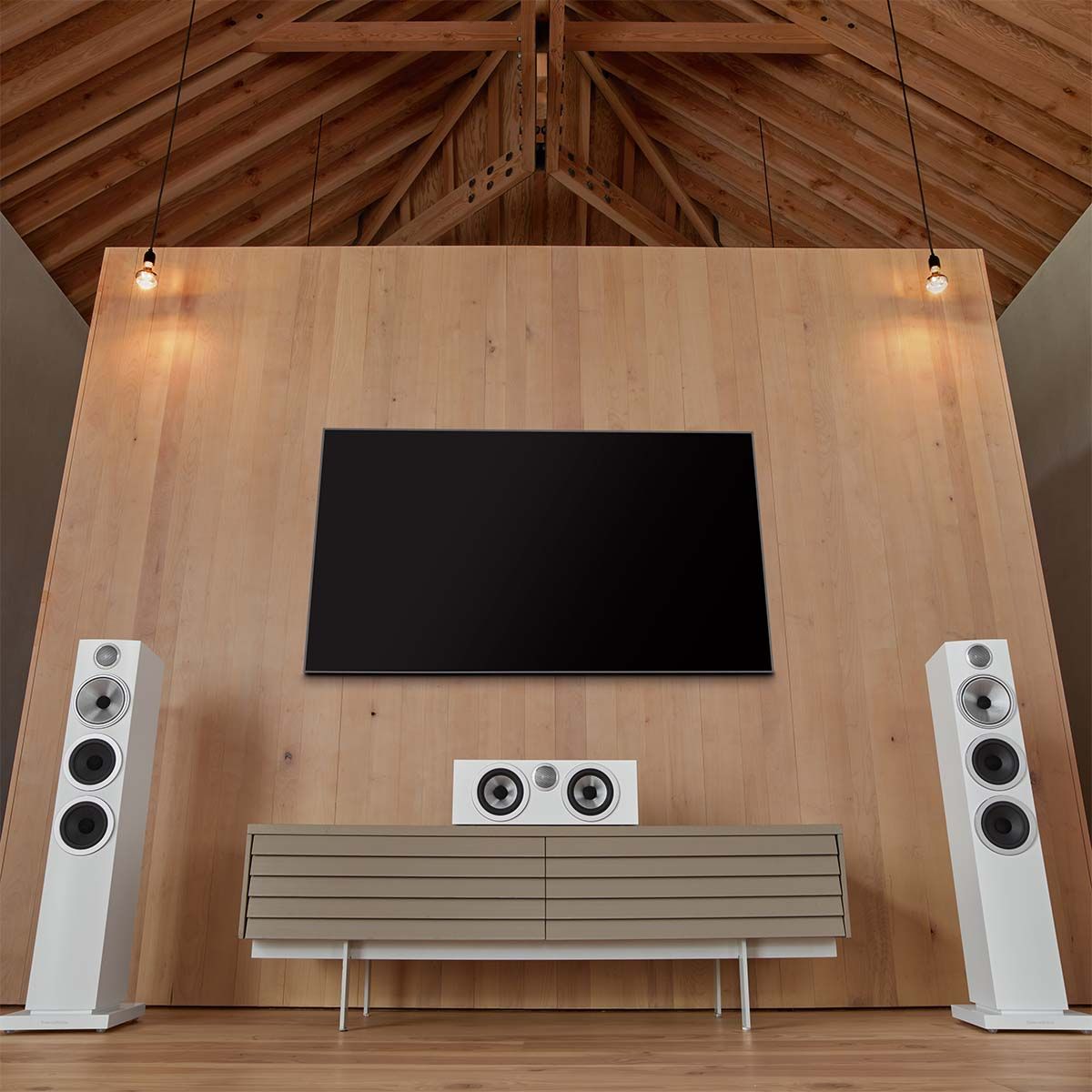Bowers & Wilkins 704 S3 3-Way Floorstanding Loudspeaker in home theater setup with tv
