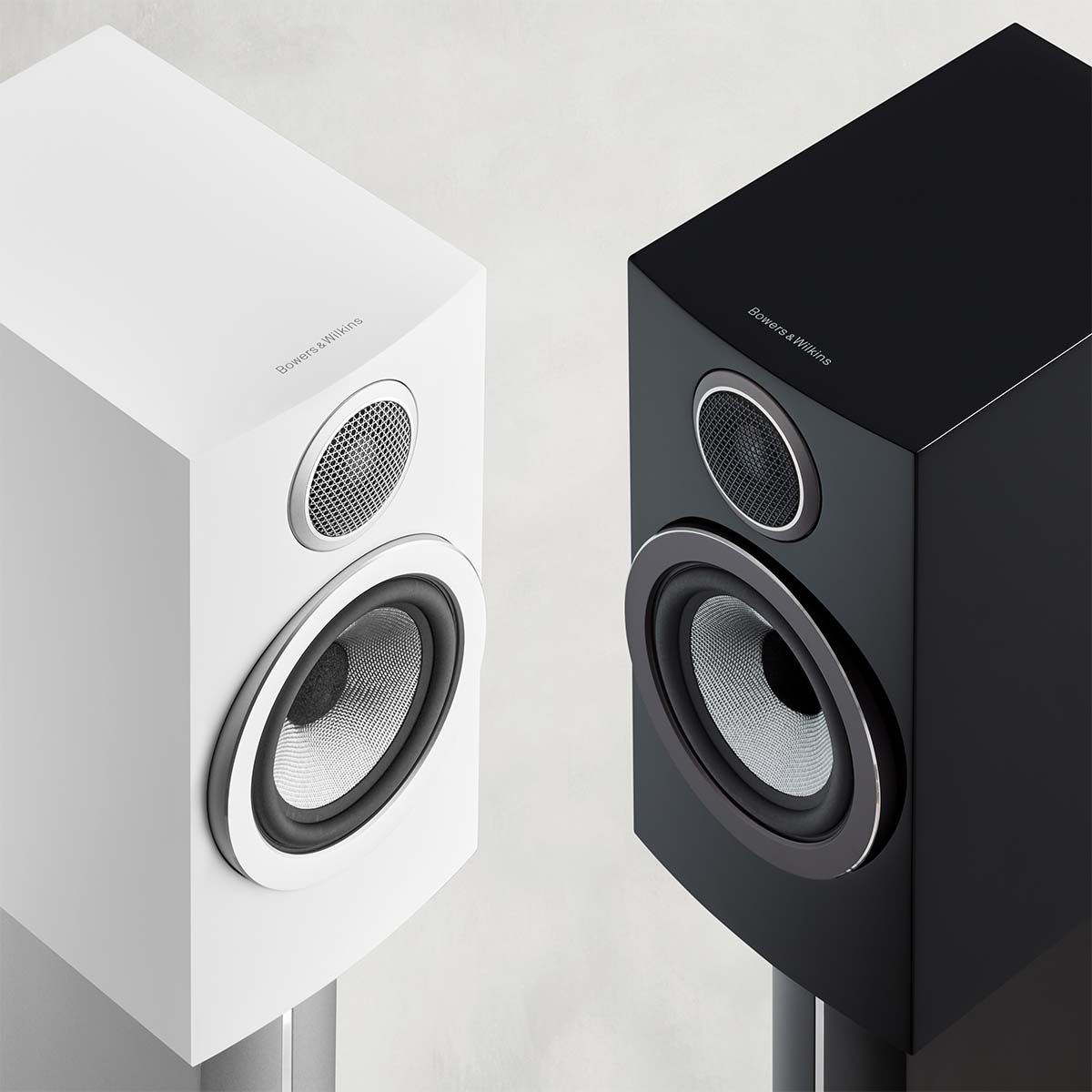 Bowers & Wilkins 707 S3 Bookshelf speakers in black and white on stands