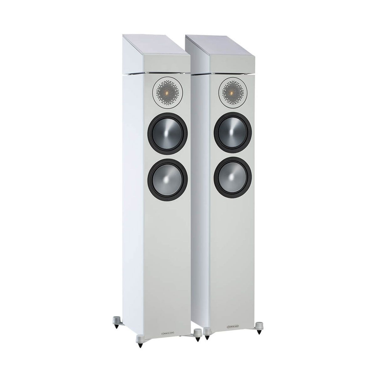 Monitor Audio Bronze AMS Atmos Speakers, White, set of two on top of a pair of Monitor floorstanding speakers