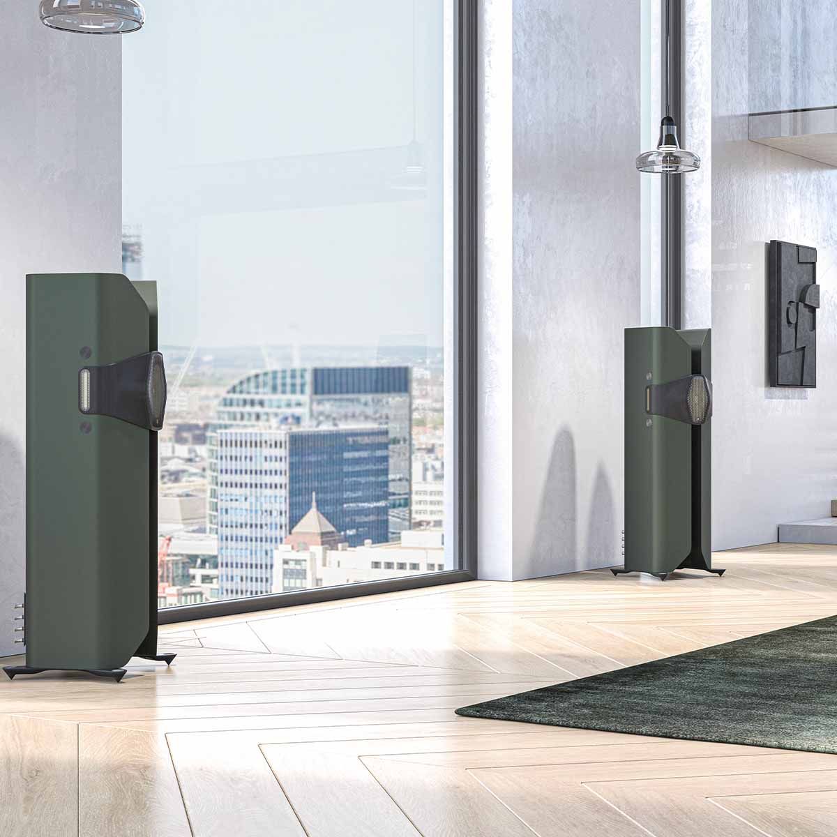Monitor Audio Hyphn Reference Floorstanding Loudspeaker - matte green pair in high rise apartment