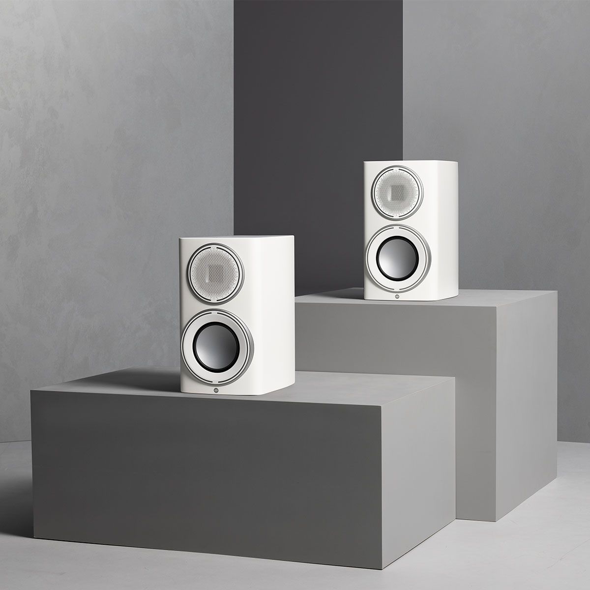 Monitor Audio Platinum 100 3G Bookshelf Loudspeaker - satin white pair on grey blocks