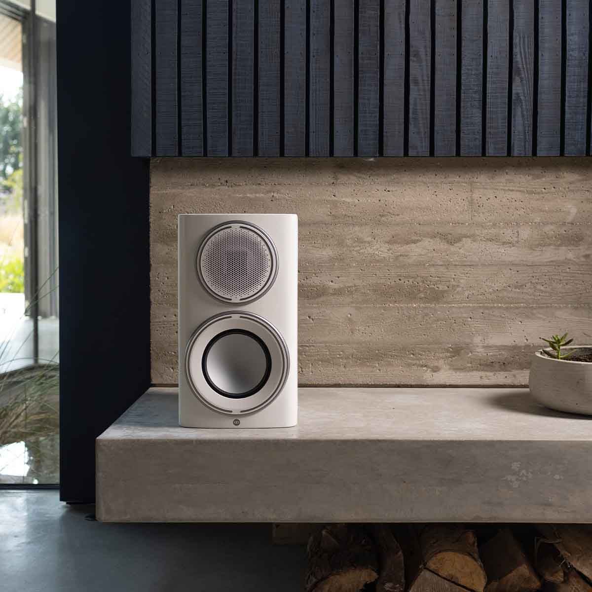 Monitor Audio Platinum 100 3G Bookshelf Loudspeaker - satin white speaker on mantle
