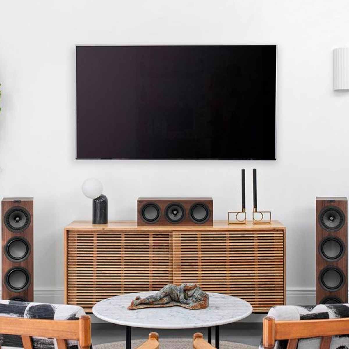 KEF Q250C Center Channel Speaker - Walnut - on entertainment stand under TV