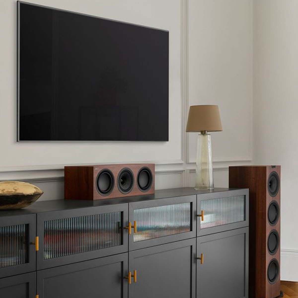 KEF Q250C Center Channel Speaker - Walnut - alternate angled view on entertainment stand under TV